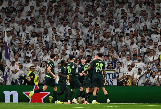 (251211) -- MADRID, Dec. 11, 2025 (Xinhua) -- Players of Manchester City celebrate scoring during the UEFA Champions League football match between Real Madrid and Manchester City in Madrid, Spain, Dec. 10, 2025. (Xinhua/Cheng Min)