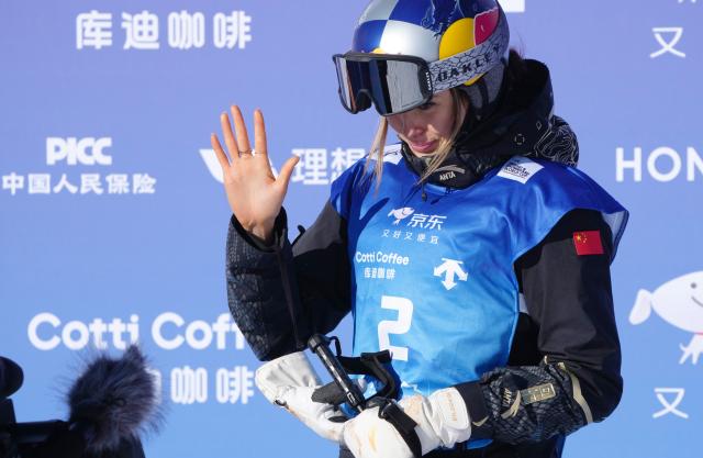 (251211) -- ZHANGJIAKOU, Dec. 11, 2025 (Xinhua) -- Gu Ailing of China reacts after the women's freeski halfpipe qualification of FIS Freeski World Cup 2025 in Zhangjiakou, north China's Hebei Province, Dec. 11, 2025. (Xinhua/Wang Peng)