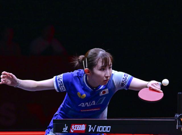 (251211) -- HONG KONG, Dec. 11, 2025 (Xinhua) -- Hayata Hina hits a return during the women's singles round of 16 match between Kuai Man of China and Hayata Hina of Japan at the WTT Finals Hong Kong 2025 in Hong Kong, south China, Dec. 11, 2025. (Xinhua/Chen Duo)