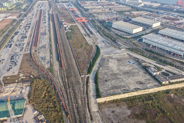 (251211) -- CHONGQING, Dec. 11, 2025 (Xinhua) -- An aerial drone photo taken on Nov. 29, 2025 shows a cargo train loaded with export-bound new energy vehicles made in Chongqing departing a commercial vehicle logistics base in Chongqing, southwest China. In recent years, as Chongqing accelerated its transformation into an inland hub for opening-up, a growing number of locally manufactured vehicles have found their way to overseas markets. The local automotive industry encompasses a wide range of power solutions such as battery electric, plug-in hybrid, extended-range, hydrogen fuel cell and battery-swapping technologies. Evolving industrial chain, product quality and supply mechanisms have all contributed to Chongqing's growing vehicle exports. 
  According to the Chongqing Customs, in the first ten months of 2025, the export value of Chongqing-manufactured vehicles increased 13.6 percent year on year, reaching 40.22 billion yuan (about 5.70 billion U.S. dollars), with the export value of electric vehicles growing 72.1 percent year on year to reach 11.65 billion yuan (about 1.65 billion U.S. dollars). (Xinhua/Huang Wei)