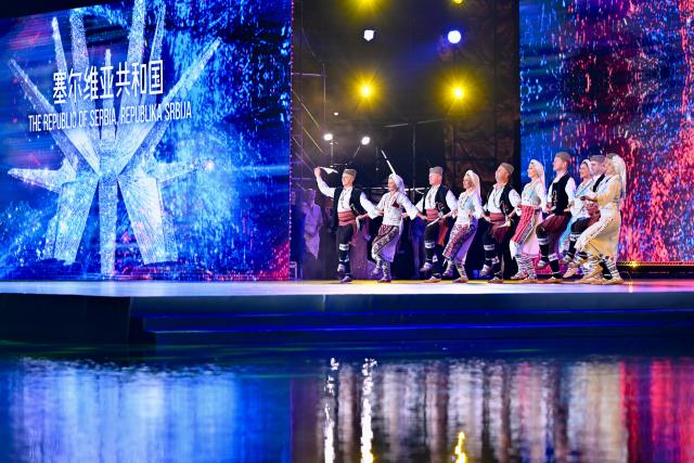 (251211) -- QUANZHOU, Dec. 11, 2025 (Xinhua) -- Actors perform a Serbian dance at the opening ceremony of the 2025 Maritime Silk Road International Cultural Tourism Festival in Quanzhou, southeast China's Fujian Province, on Dec. 11, 2025. (Xinhua/Jiang Kehong)