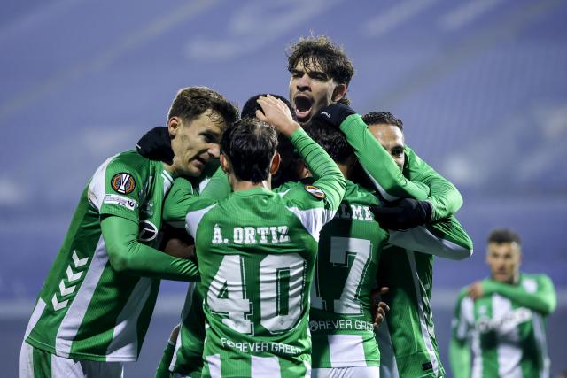 (251212) -- ZAGREB, Dec. 12, 2025 (Xinhua) -- Players of Real Betis celebrate team's third goal during the UEFA Europa League 2025/26 League Phase match between GNK Dinamo and Real Betis in Zagreb, Croatia, on Dec. 11, 2025. (Sanjin Strukic/PIXSELL via Xinhua)