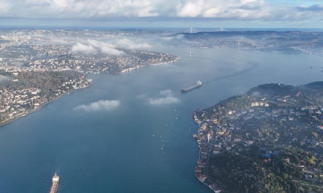 (251212) -- BEIJING, Dec. 12, 2025 (Xinhua) -- An aerial drone photo taken on Dec. 11, 2025 shows vessels sailing on the Bosphorus Strait in Istanbul, Türkiye. (Xinhua/Liu Lei)