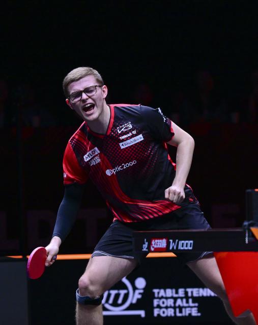 (251212) -- HONG KONG, Dec. 12, 2025 (Xinhua) -- Alexis Lebrun of France reacts during the men's singles quarterfinal match against Wang Chuqin of China at the WTT Finals Hong Kong 2025 in Hong Kong, south China, Dec. 12, 2025. (Xinhua/Chen Duo)