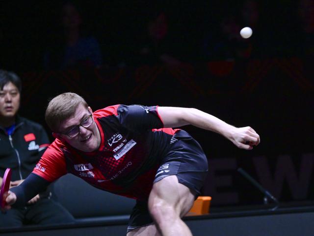 (251212) -- HONG KONG, Dec. 12, 2025 (Xinhua) -- Alexis Lebrun of France hits a return during the men's singles quarterfinal match against Wang Chuqin of China at the WTT Finals Hong Kong 2025 in Hong Kong, south China, Dec. 12, 2025. (Xinhua/Chen Duo)