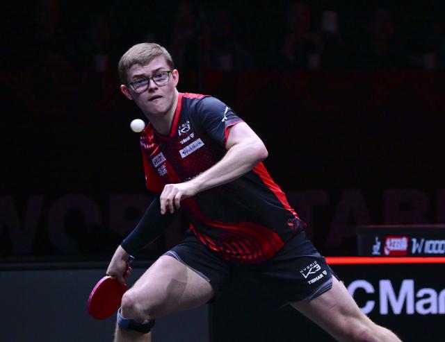 (251212) -- HONG KONG, Dec. 12, 2025 (Xinhua) -- Alexis Lebrun of France hits a return during the men's singles quarterfinal match against Wang Chuqin of China at the WTT Finals Hong Kong 2025 in Hong Kong, south China, Dec. 12, 2025. (Xinhua/Chen Duo)