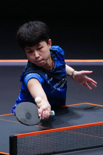 (251212) -- HONG KONG, Dec. 12, 2025 (Xinhua) -- Joo Cheonhui of South Korea hits a return during the women's singles quarterfinal match against Wang Manyu of China at the WTT Finals Hong Kong 2025 in Hong Kong, south China, Dec. 12, 2025. (Xinhua/Zhu Wei)