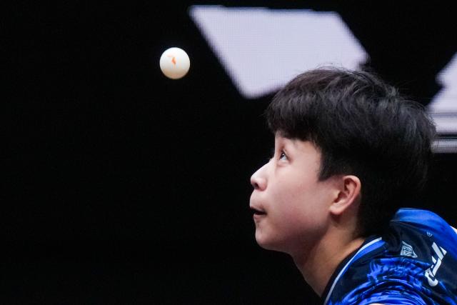 (251212) -- HONG KONG, Dec. 12, 2025 (Xinhua) -- Joo Cheonhui of South Korea serves during the women's singles quarterfinal match against Wang Manyu of China at the WTT Finals Hong Kong 2025 in Hong Kong, south China, Dec. 12, 2025. (Xinhua/Zhu Wei)