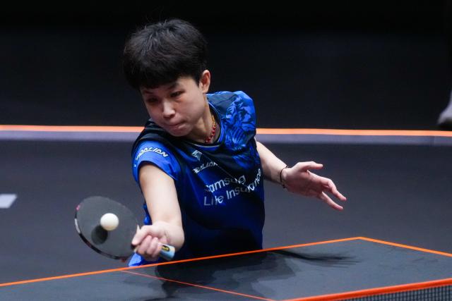 (251212) -- HONG KONG, Dec. 12, 2025 (Xinhua) -- Joo Cheonhui of South Korea hits a return during the women's singles quarterfinal match against Wang Manyu of China at the WTT Finals Hong Kong 2025 in Hong Kong, south China, Dec. 12, 2025. (Xinhua/Zhu Wei)
