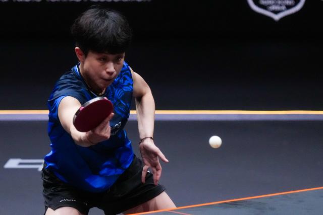 (251212) -- HONG KONG, Dec. 12, 2025 (Xinhua) -- Joo Cheonhui of South Korea hits a return during the women's singles quarterfinal match against Wang Manyu of China at the WTT Finals Hong Kong 2025 in Hong Kong, south China, Dec. 12, 2025. (Xinhua/Zhu Wei)