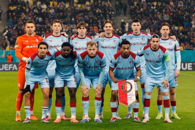 (251212) -- BUCHAREST, Dec. 12, 2025 (Xinhua) -- Feyenoord's starting players pose before the UEFA Europa League football match against FCSB in Bucharest, Romania, Dec. 11, 2025. (Photo by Cristian Cristel/Xinhua)