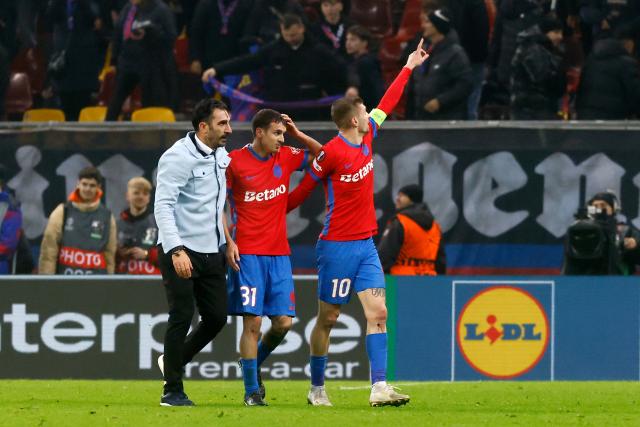 (251212) -- BUCHAREST, Dec. 12, 2025 (Xinhua) -- FCSB's Florin Tanase (R) celebrates with Juri Cisotti (C) and coach Elias Charalambous after scoring the fourth goal during the UEFA Europa League football match against Feyenoord in Bucharest, Romania, Dec. 11, 2025. (Photo by Cristian Cristel/Xinhua)