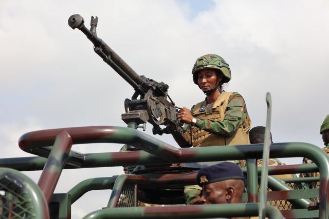 (251212) -- ACCRA, Dec. 12, 2025 (Xinhua) -- Soldiers participate in a joint exercise launched by Ghanaian security services in Accra, Ghana, Dec. 11, 2025. Ghanaian security services launched a joint exercise on Thursday to showcase their preparedness to maintain peace and security in the country.
  The "Show of Force" operation, involving the military, police, immigration, fire service, prisons, and the customs division of the Ghana Revenue Authority, deployed personnel, combat gear and hardware along major routes from the city of Accra to communities outside the capital to boost inter-agency cooperation and reinforce the country's security posture. (Photo by Seth/Xinhua)
