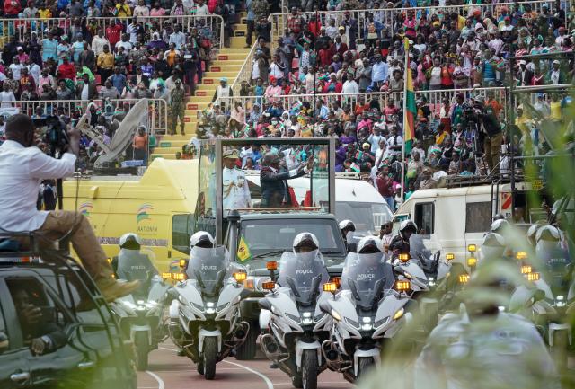 (251212) -- NAIROBI, Dec. 12, 2025 (Xinhua) -- Kenyan President William Ruto waves to the crowd at a celebration for the 62nd anniversary of Kenya's independence in Nairobi, Kenya, Dec. 12, 2025. A celebration marking the 62nd anniversary of Kenya's independence was held at Nyayo Stadium in Nairobi on Friday.
   Kenya's Jamhuri Day or Independence Day, observed on Dec. 12 each year, is one of the most important national holidays in Kenya. Kenya gained independence from Britain on Dec. 12, 1963. (Xinhua/Han Xu)