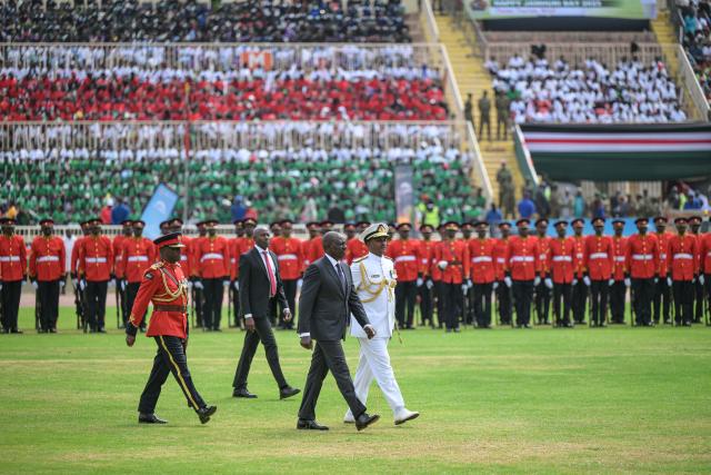 (251212) -- NAIROBI, Dec. 12, 2025 (Xinhua) -- Kenyan President William Ruto inspects the guard of honor during a celebration for the 62nd anniversary of Kenya's independence in Nairobi, Kenya, Dec. 12, 2025. A celebration marking the 62nd anniversary of Kenya's independence was held at Nyayo Stadium in Nairobi on Friday.
   Kenya's Jamhuri Day or Independence Day, observed on Dec. 12 each year, is one of the most important national holidays in Kenya. Kenya gained independence from Britain on Dec. 12, 1963. (Xinhua/Yang Guang)