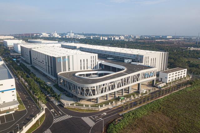 (251212) -- HAIKOU, Dec. 12, 2025 (Xinhua) -- An aerial drone photo taken on Nov. 23, 2025 shows a view of a logistics hub in the Haikou Comprehensive Bonded Zone in south China's Hainan Province. China's Hainan Free Trade Port (FTP) is preparing for island-wide special customs operations, a major milestone in the opening-up drive of the world's second-largest economy despite rising protectionism worldwide.
   As the "experimental field" of the Hainan FTP, the 13 key industrial parks within the port have become significant drivers of Hainan's economic growth. In the first three quarters of 2025, the 13 key industrial parks achieved a revenue of 1,992.451 billion yuan (about 282.427 billion U.S. dollars), representing a year-on-year increase of 4.1%. (Xinhua/Pu Xiaoxu)