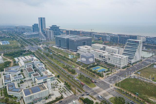 (251212) -- HAIKOU, Dec. 12, 2025 (Xinhua) -- An aerial drone photo taken on Nov. 15, 2025 shows a view of the Haikou Jiangdong New Area in south China's Hainan Province. China's Hainan Free Trade Port (FTP) is preparing for island-wide special customs operations, a major milestone in the opening-up drive of the world's second-largest economy despite rising protectionism worldwide.
   As the "experimental field" of the Hainan FTP, the 13 key industrial parks within the port have become significant drivers of Hainan's economic growth. In the first three quarters of 2025, the 13 key industrial parks achieved a revenue of 1,992.451 billion yuan (about 282.427 billion U.S. dollars), representing a year-on-year increase of 4.1%. (Xinhua/Pu Xiaoxu)