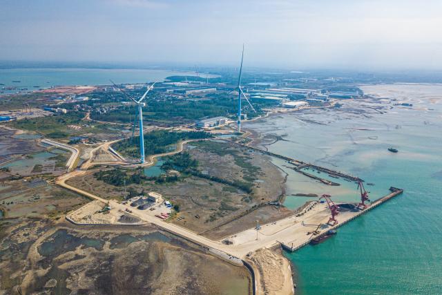 (251212) -- HAIKOU, Dec. 12, 2025 (Xinhua) -- An aerial drone photo taken on Nov. 22, 2025 shows a view of the Lingao Jinpai Port Development Zone in south China's Hainan Province. China's Hainan Free Trade Port (FTP) is preparing for island-wide special customs operations, a major milestone in the opening-up drive of the world's second-largest economy despite rising protectionism worldwide.
   As the "experimental field" of the Hainan FTP, the 13 key industrial parks within the port have become significant drivers of Hainan's economic growth. In the first three quarters of 2025, the 13 key industrial parks achieved a revenue of 1,992.451 billion yuan (about 282.427 billion U.S. dollars), representing a year-on-year increase of 4.1%. (Xinhua/Pu Xiaoxu)