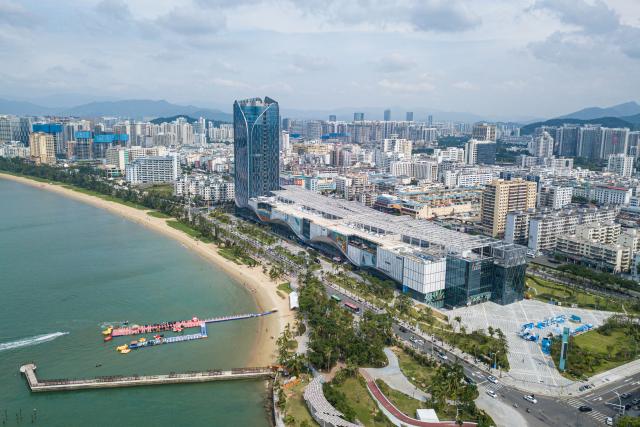 (251212) -- HAIKOU, Dec. 12, 2025 (Xinhua) -- An aerial drone photo taken on Nov. 1, 2025 shows a view of the Sanya Central Business District in south China's Hainan Province. China's Hainan Free Trade Port (FTP) is preparing for island-wide special customs operations, a major milestone in the opening-up drive of the world's second-largest economy despite rising protectionism worldwide.
   As the "experimental field" of the Hainan FTP, the 13 key industrial parks within the port have become significant drivers of Hainan's economic growth. In the first three quarters of 2025, the 13 key industrial parks achieved a revenue of 1,992.451 billion yuan (about 282.427 billion U.S. dollars), representing a year-on-year increase of 4.1%. (Xinhua/Pu Xiaoxu)