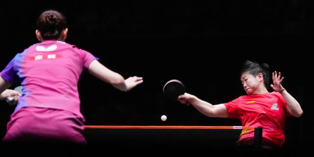 (251212) -- HONG KONG, Dec. 12, 2025 (Xinhua) -- Sun Yingsha (R) hits a return during the women's singles quarterfinal match between Sun Yingsha of China and Nagasaki Miyu of Japan at the WTT Finals Hong Kong 2025 in Hong Kong, south China, Dec. 12, 2025. (Xinhua/Zhu Wei)