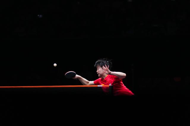(251212) -- HONG KONG, Dec. 12, 2025 (Xinhua) -- Sun Yingsha hits a return during the women's singles quarterfinal match between Sun Yingsha of China and Nagasaki Miyu of Japan at the WTT Finals Hong Kong 2025 in Hong Kong, south China, Dec. 12, 2025. (Xinhua/Zhu Wei)