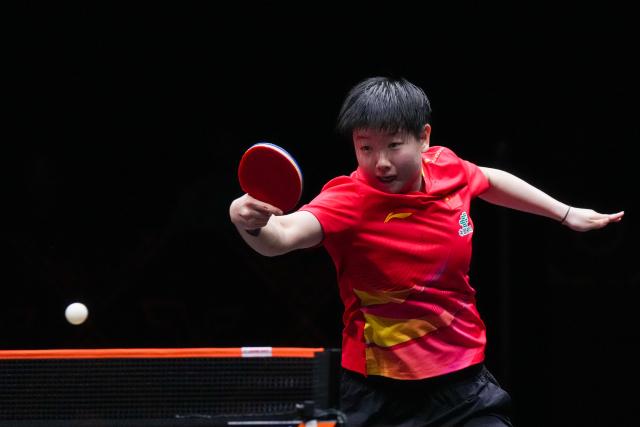 (251212) -- HONG KONG, Dec. 12, 2025 (Xinhua) -- Sun Yingsha hits a return during the women's singles quarterfinal match between Sun Yingsha of China and Nagasaki Miyu of Japan at the WTT Finals Hong Kong 2025 in Hong Kong, south China, Dec. 12, 2025. (Xinhua/Zhu Wei)