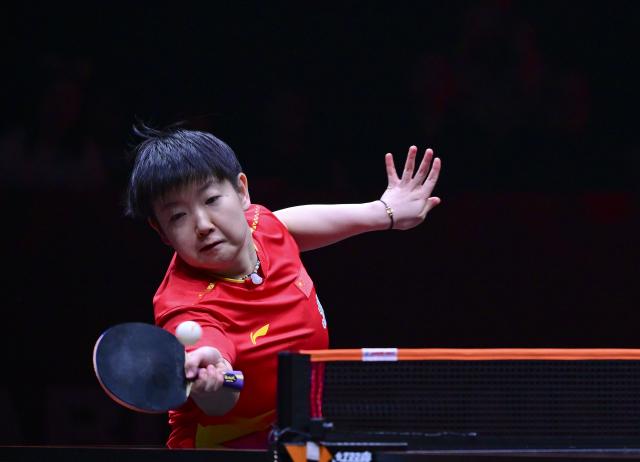 (251212) -- HONG KONG, Dec. 12, 2025 (Xinhua) -- Sun Yingsha hits a return during the women's singles quarterfinal match between Sun Yingsha of China and Nagasaki Miyu of Japan at the WTT Finals Hong Kong 2025 in Hong Kong, south China, Dec. 12, 2025. (Xinhua/Chen Duo)