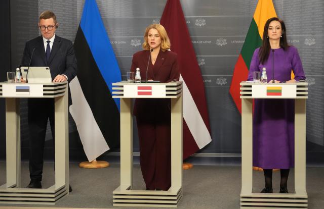 (251212) -- RIGA, Dec. 12, 2025 (Xinhua) -- Estonian Prime Minister Kristen Michal (L), Latvian Prime Minister Evika Silina (C) and Lithuanian Prime Minister Inga Ruginiene attend a press conference after their meeting in Riga, Latvia, Dec. 12, 2025. Riga on Friday hosted a meeting of the prime ministers of Latvia, Lithuania and Estonia, focusing on regional security and joint infrastructure projects, marking the end of Latvia's 2025 chairmanship of the Baltic Council of Ministers. (Photo by Edijs Palens/Xinhua)