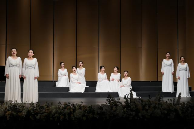 (251212) -- DHAHRAN, Dec. 12, 2025 (Xinhua) -- The China National Center for the Performing Arts (NCPA) Chorus perform at the World Famous Songs Concert at the King Abdulaziz Center for World Culture, in Dhahran, Saudi Arabia, Dec. 11, 2025. Chinese and Saudi artists performed together on Thursday in a concert that marked the highlight of the NCPA Chorus's first tour in the kingdom. (Xinhua/Wang Haizhou)