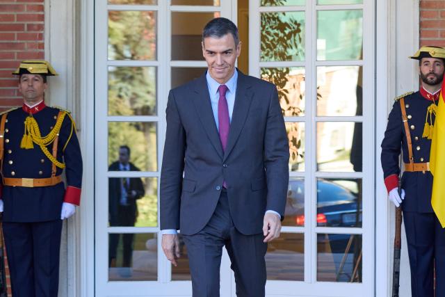 (251213) -- MADRID, Dec. 13, 2025 (Xinhua) -- This file photo taken on Nov. 27, 2025 shows Spanish Prime Minister Pedro Sanchez walking out of La Moncloa Palace in Madrid, Spain. U.S. operations in international waters targeting alleged drug-trafficking activities pose a challenge to international law and raise questions about the West's consistency in applying its principles, Sanchez has said.
   TO GO WITH "U.S. operations in international waters challenge international law: Spanish PM" (Xinhua/Meng Dingbo)