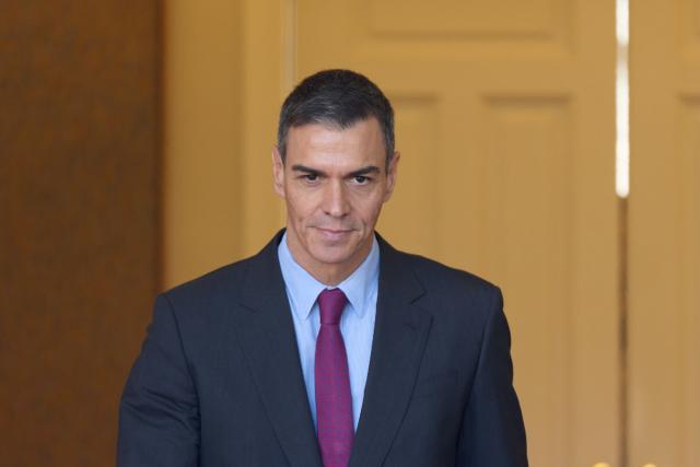 (251213) -- MADRID, Dec. 13, 2025 (Xinhua) -- This file photo taken on Nov. 27, 2025 shows Spanish Prime Minister Pedro Sanchez walking out of La Moncloa Palace in Madrid, Spain. U.S. operations in international waters targeting alleged drug-trafficking activities pose a challenge to international law and raise questions about the West's consistency in applying its principles, Sanchez has said.
   TO GO WITH "U.S. operations in international waters challenge international law: Spanish PM" (Xinhua/Meng Dingbo)