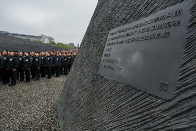 (251213) -- NANJING, Dec. 13, 2025 (Xinhua) -- A national memorial ceremony for the Nanjing Massacre victims is held at the Memorial Hall of the Victims in Nanjing Massacre by Japanese Invaders in Nanjing, capital of east China's Jiangsu Province, Dec. 13, 2025. The 12th national memorial day was observed in Nanjing on Saturday to honor about 300,000 victims killed by Japanese troops during the Nanjing Massacre, in a year that marks the 80th anniversary of the end of World War II (WWII). (Xinhua/Li Bo)