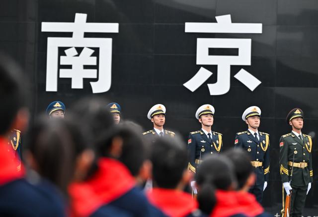 (251213) -- NANJING, Dec. 13, 2025 (Xinhua) -- A national memorial ceremony for the Nanjing Massacre victims is held at the Memorial Hall of the Victims in Nanjing Massacre by Japanese Invaders in Nanjing, capital of east China's Jiangsu Province, Dec. 13, 2025. The 12th national memorial day was observed in Nanjing on Saturday to honor about 300,000 victims killed by Japanese troops during the Nanjing Massacre, in a year that marks the 80th anniversary of the end of World War II (WWII). (Xinhua/Ji Chunpeng)