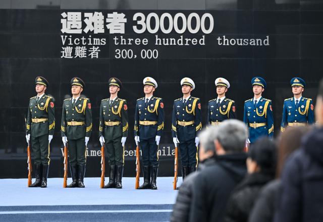 (251213) -- NANJING, Dec. 13, 2025 (Xinhua) -- A national memorial ceremony for the Nanjing Massacre victims is held at the Memorial Hall of the Victims in Nanjing Massacre by Japanese Invaders in Nanjing, capital of east China's Jiangsu Province, Dec. 13, 2025. The 12th national memorial day was observed in Nanjing on Saturday to honor about 300,000 victims killed by Japanese troops during the Nanjing Massacre, in a year that marks the 80th anniversary of the end of World War II (WWII). (Xinhua/Ji Chunpeng)