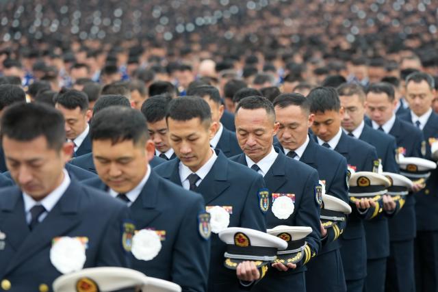 (251213) -- NANJING, Dec. 13, 2025 (Xinhua) -- A national memorial ceremony for the Nanjing Massacre victims is held at the Memorial Hall of the Victims in Nanjing Massacre by Japanese Invaders in Nanjing, capital of east China's Jiangsu Province, Dec. 13, 2025. The 12th national memorial day was observed in Nanjing on Saturday to honor about 300,000 victims killed by Japanese troops during the Nanjing Massacre, in a year that marks the 80th anniversary of the end of World War II (WWII). (Xinhua/Li Bo)
