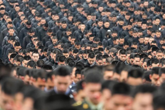 (251213) -- NANJING, Dec. 13, 2025 (Xinhua) -- A national memorial ceremony for the Nanjing Massacre victims is held at the Memorial Hall of the Victims in Nanjing Massacre by Japanese Invaders in Nanjing, capital of east China's Jiangsu Province, Dec. 13, 2025. The 12th national memorial day was observed in Nanjing on Saturday to honor about 300,000 victims killed by Japanese troops during the Nanjing Massacre, in a year that marks the 80th anniversary of the end of World War II (WWII). (Xinhua/Li Bo)