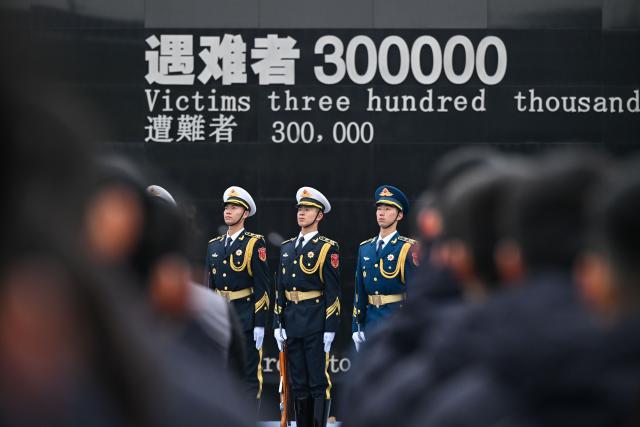 (251213) -- NANJING, Dec. 13, 2025 (Xinhua) -- A national memorial ceremony for the Nanjing Massacre victims is held at the Memorial Hall of the Victims in Nanjing Massacre by Japanese Invaders in Nanjing, capital of east China's Jiangsu Province, Dec. 13, 2025. The 12th national memorial day was observed in Nanjing on Saturday to honor about 300,000 victims killed by Japanese troops during the Nanjing Massacre, in a year that marks the 80th anniversary of the end of World War II (WWII). (Xinhua/Ji Chunpeng)