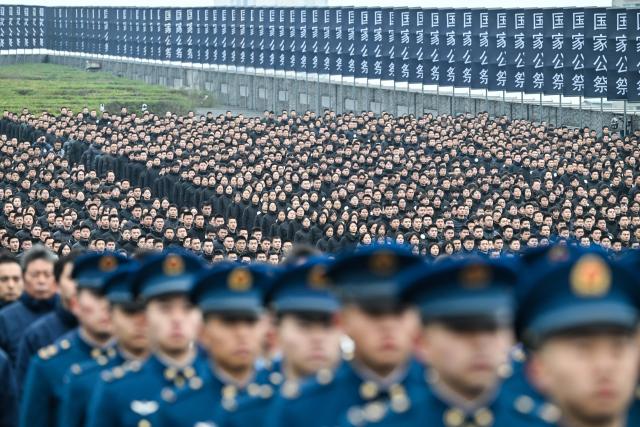 (251213) -- NANJING, Dec. 13, 2025 (Xinhua) -- A national memorial ceremony for the Nanjing Massacre victims is held at the Memorial Hall of the Victims in Nanjing Massacre by Japanese Invaders in Nanjing, capital of east China's Jiangsu Province, Dec. 13, 2025. The 12th national memorial day was observed in Nanjing on Saturday to honor about 300,000 victims killed by Japanese troops during the Nanjing Massacre, in a year that marks the 80th anniversary of the end of World War II (WWII). (Xinhua/Ji Chunpeng)