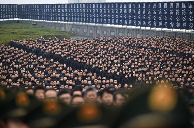 (251213) -- NANJING, Dec. 13, 2025 (Xinhua) -- A national memorial ceremony for the Nanjing Massacre victims is held at the Memorial Hall of the Victims in Nanjing Massacre by Japanese Invaders in Nanjing, capital of east China's Jiangsu Province, Dec. 13, 2025. The 12th national memorial day was observed in Nanjing on Saturday to honor about 300,000 victims killed by Japanese troops during the Nanjing Massacre, in a year that marks the 80th anniversary of the end of World War II (WWII). (Xinhua/Li Xiang)