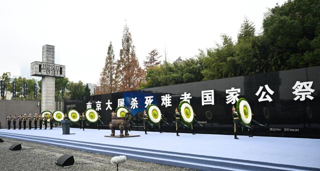 (251213) -- NANJING, Dec. 13, 2025 (Xinhua) -- A national memorial ceremony for the Nanjing Massacre victims is held at the Memorial Hall of the Victims in Nanjing Massacre by Japanese Invaders in Nanjing, capital of east China's Jiangsu Province, Dec. 13, 2025. The 12th national memorial day was observed in Nanjing on Saturday to honor about 300,000 victims killed by Japanese troops during the Nanjing Massacre, in a year that marks the 80th anniversary of the end of World War II (WWII). (Xinhua/Li Xiang)