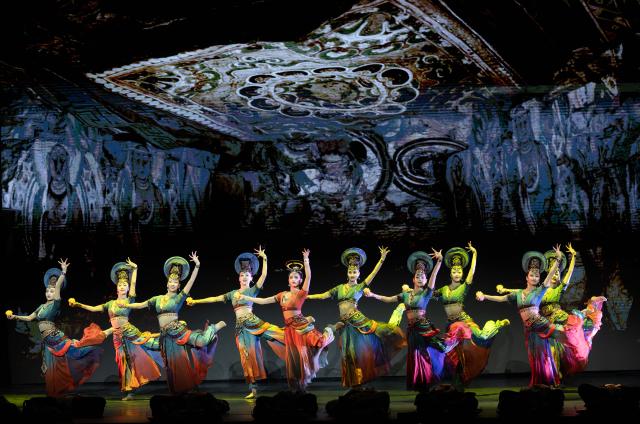 (251213) -- TORONTO, Dec. 13, 2025 (Xinhua) -- Dancers perform the Chinese dance drama Oriental Legend in Toronto, Canada, on Dec. 12, 2025. The drama, showcasing the elegance of traditional Chinese culture and the allure of multicultural integration, will have multiple performances in Toronto and Ottawa in December. (Photo by Zou Zheng/Xinhua)