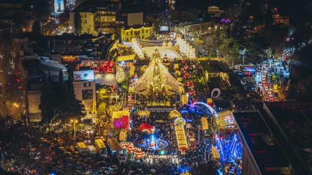 (251213) -- TBILISI, Dec. 13, 2025 (Xinhua) -- An illuminated main New Year tree of Georgia and other decorations are seen at the First Republic Square in Tbilisi, Georgia, Dec. 12, 2025. (Tbilisi City Government/Handout via Xinhua)