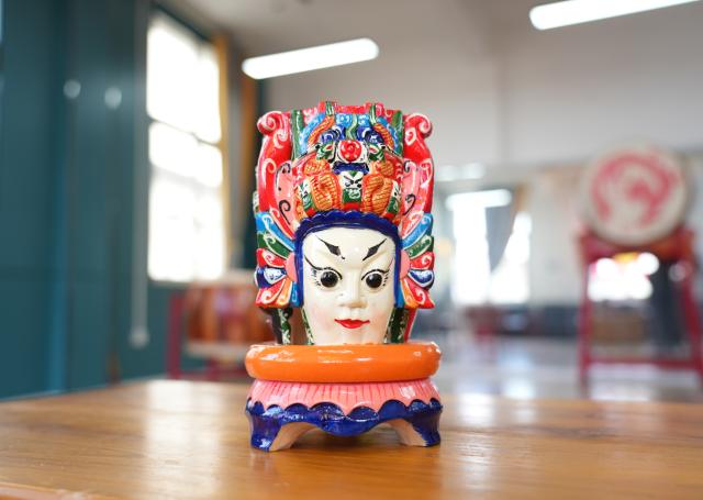 (251213) -- GUIYANG, Dec. 13, 2025 (Xinhua) -- A lacquered wooden mask of Dixi opera is pictured in Malu Village of Qiannan Buyi and Miao Autonomous Prefecture in southwest China's Guizhou Province, Nov. 20, 2025. TO GO WITH Across China: "Living-fossil" folk opera connects SW China village to its past (Xinhua)