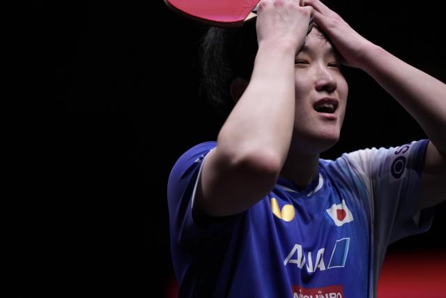 (251213) -- HONG KONG, Dec. 13, 2025 (Xinhua) -- Harimoto Tomokazu celebrates after the men's singles quarterfianl match between Harimoto Tomokazu of Japan and Felix Lebrun of France at the WTT Finals Hong Kong 2025 in Hong Kong, south China, Dec. 13, 2025. (Xinhua/Lui Siu Wai)