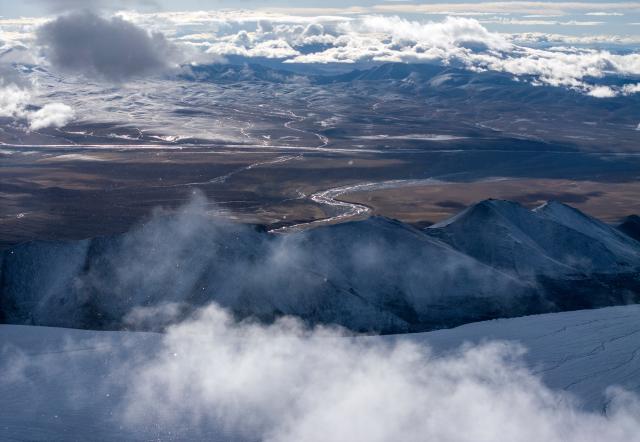 (251213) -- LHASA, Dec. 13, 2025 (Xinhua) -- An aerial drone photo taken at the Purog Kangri Glacier on Sept. 11, 2024 shows the scenery of the Changtang National Nature Reserve, southwest China's Xizang Autonomous Region. Located in the northern part of Xizang with an average altitude exceeding 4,500 meters, the Changtang National Nature Reserve is home to over 30 kinds of wild animals listed on China's national-level protection catalogue, including Tibetan antelopes and wild yaks. (Xinhua/Jiang Fan)