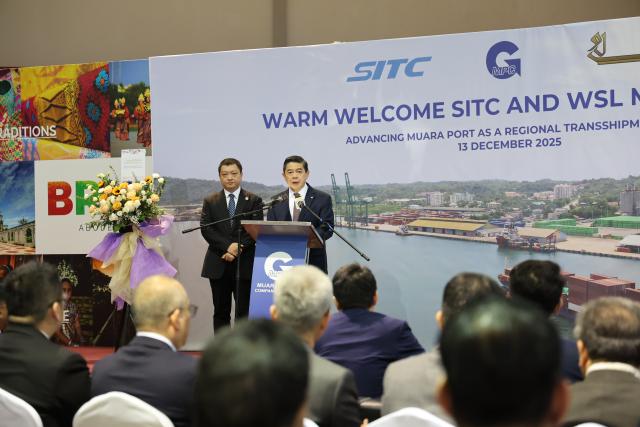(251213) -- BANDAR SERI BEGAWAN, Dec. 13, 2025 (Xinhua) -- Haji Mohd Amin Liew Abdullah, Brunei's minister at the Prime Minister's Office and second minister of finance and economy, speaks at the launch ceremony of the new shipping services at Muara Port in Brunei, Dec. 13, 2025. TO GO WITH "New shipping services make maiden calls at Brunei's Muara Port" (Xinhua/Li Meng)