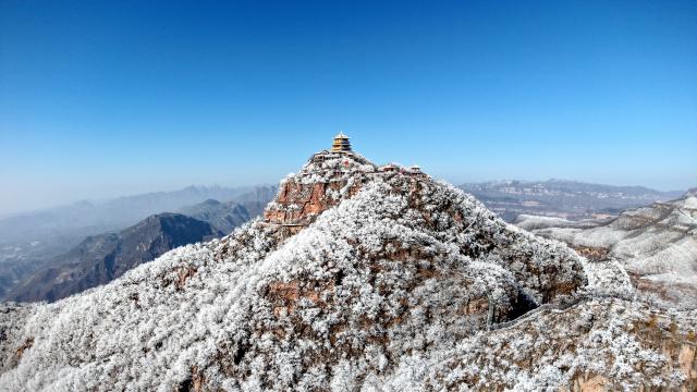 (251213) -- BEIJING, Dec. 13, 2025 (Xinhua) -- A drone photo taken on Dec. 13, 2025 shows the snow scenery of the Wangwu Mountain scenic spot in Jiyuan, central China's Henan Province. (Photo by Duan Erping/Xinhua)