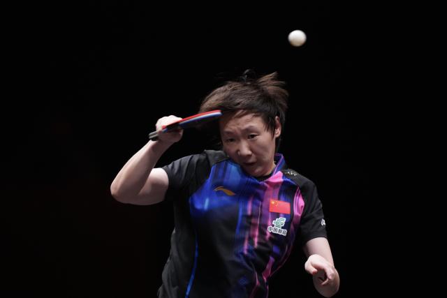 (251213) -- HONG KONG, Dec. 13, 2025 (Xinhua) -- Wang Manyu competes during the women's singles semifinal match between Wang Manyu of China and Chen Yi of China at the WTT Finals Hong Kong 2025 in Hong Kong, south China, Dec. 13, 2025. (Xinhua/Lui Siu Wai)
