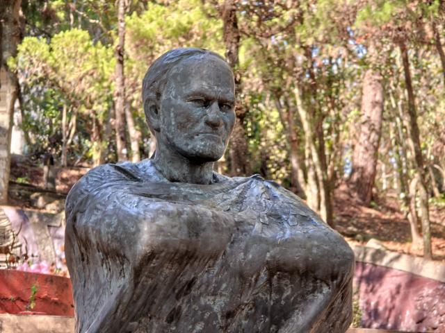 (251213) -- TAIPEI, Dec. 13, 2025 (Xinhua) -- This photo taken with a mobile phone on Dec. 8, 2025 shows a statue of Mona Rudao in a memorial park in Nantou County, southeast China's Taiwan. TO GO WITH "Feature: Seediq survivor descendants: Where wounds heal, memories should continue to speak" (Xinhua/Wang Chenghao)