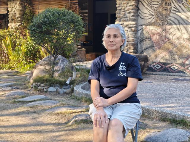 (251213) -- TAIPEI, Dec. 13, 2025 (Xinhua) -- This photo taken with a mobile phone shows Mahung Pawan speaking in an interview with Xinhua in Nantou County, southeast China's Taiwan, Dec. 8, 2025. TO GO WITH "Feature: Seediq survivor descendants: Where wounds heal, memories should continue to speak" (Xinhua/Wang Chenghao)